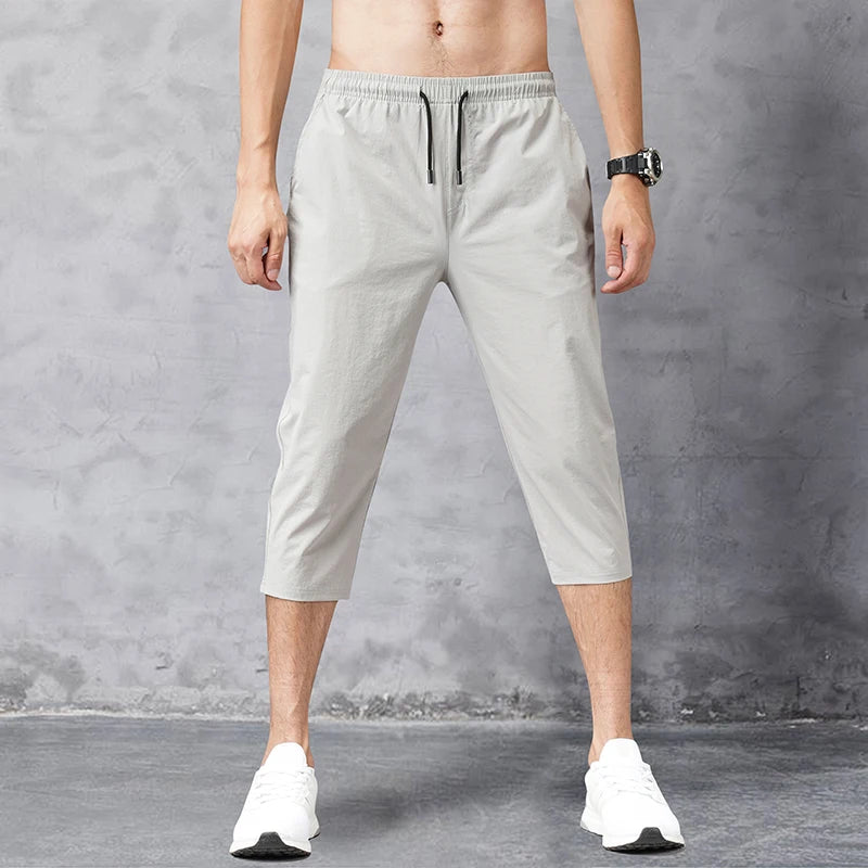 Męskie spodnie 3/4 sportowe – szybkoschnące, oddychające, lekkie, na outdoor i trening