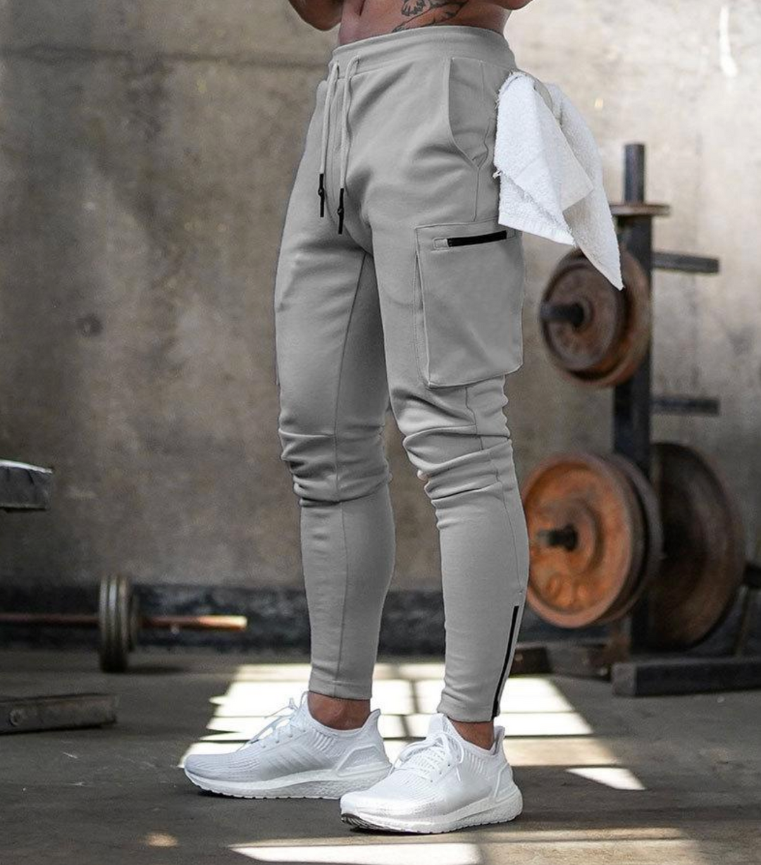 Męskie spodnie sportowe slim fit – elastyczne spodnie treningowe z kieszeniami i zamkami