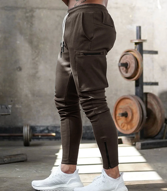 Męskie spodnie sportowe slim fit – elastyczne spodnie treningowe z kieszeniami i zamkami
